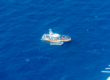 So-called Libyan coastguard pulling back about 70 people